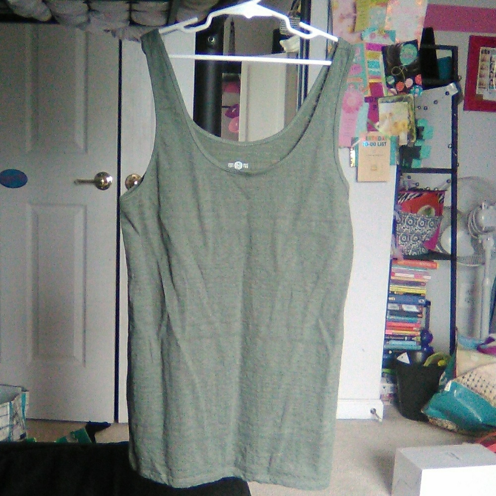 A green patterned tank top.
